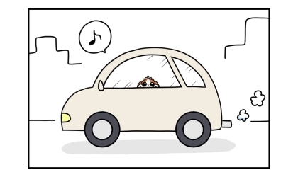 飼い主の運転する車に乗ってお出かけする犬。うれしそう
